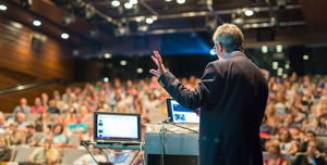Axeten public speaking at live events & online